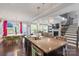 Open floor plan featuring a kitchen island that overlooks the dining and living areas at 2657 Cheverny Pl, Concord, NC 28027