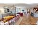 Open concept dining room with hardwood floors and view of living room at 3010 Cunningham Farm Dr, Indian Trail, NC 28079