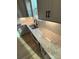 Kitchen sink and countertop detail with gray cabinets and quartz countertop at 3014 Cunningham Farm Dr, Indian Trail, NC 28079