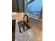 A stainless steel kitchen sink with black faucet and a view of the outdoors from the window at 3014 Cunningham Farm Dr, Indian Trail, NC 28079