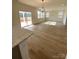 Spacious living area with hardwood floors and sliding glass doors at 3014 Cunningham Farm Dr, Indian Trail, NC 28079