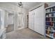 Stylish room with a Murphy bed, built-in shelving, and an ensuite bathroom at 7248 Waterwheel Sw St, Concord, NC 28025
