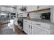 Kitchen featuring stainless appliances, granite counters, white cabinetry, and subway tile backsplash at 7248 Waterwheel Sw St, Concord, NC 28025