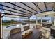 Stunning outdoor area with a beautiful pool, relaxing patio furniture, and overhead lights at 7248 Waterwheel Sw St, Concord, NC 28025