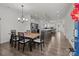 Bright and airy dining room featuring an open floorplan and hardwood floors at 1109 Freeman View Dr, Albemarle, NC 28001