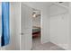 Bright walk-in closet with shelving and a glimpse into a bedroom, offering ample storage space at 1109 Freeman View Dr, Albemarle, NC 28001