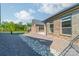 Brick home with rock landscaping detail along the side yard at 2014 Newstyle Way, Tega Cay, SC 29708
