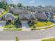 Charming brick home with a well-manicured lawn and a two-car garage in a suburban neighborhood at 2014 Newstyle Way, Tega Cay, SC 29708