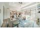 Bright, open living room with modern decor, plush seating, and large window overlooking the outdoor area at 2014 Newstyle Way, Tega Cay, SC 29708