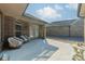 Brick patio showcasing seating and a view of the backyard at 2014 Newstyle Way, Tega Cay, SC 29708
