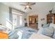 Inviting sitting room with glass doors, opening to an outdoor space, and flowing into a bedroom at 2014 Newstyle Way, Tega Cay, SC 29708