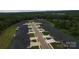 Overhead shot showcasing a well-planned community with neat streets and manicured lawns, surrounded by nature at 3335 48Th Ne Ave # 13B, Hickory, NC 28601