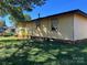 Backyard view showcasing the home's exterior and lawn at 1424 Montana Dr, Charlotte, NC 28216