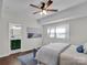 Bedroom with ensuite bathroom and hardwood floors at 301 S Washington St, Monroe, NC 28112