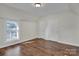 Bedroom with hardwood floors and double closets at 301 S Washington St, Monroe, NC 28112