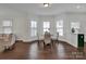 Charming dining area with bay window and hardwood floors at 301 S Washington St, Monroe, NC 28112