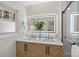 Modern bathroom with double vanity and marble countertop at 5731 Brookhaven Rd, Charlotte, NC 28210