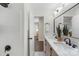 Modern bathroom with double vanity and marble countertop at 5731 Brookhaven Rd, Charlotte, NC 28210