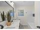 Modern bathroom with double vanity and marble countertop at 5731 Brookhaven Rd, Charlotte, NC 28210