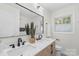 Modern bathroom with double vanity and marble countertop at 5731 Brookhaven Rd, Charlotte, NC 28210