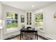 Built-in corner shelving and a desk create a functional home office at 5731 Brookhaven Rd, Charlotte, NC 28210