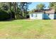 Large backyard with grass and a partially visible house at 1350 8Th Nw St, Hickory, NC 28601