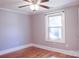 Light-filled bedroom with hardwood floors and window at 1350 8Th Nw St, Hickory, NC 28601