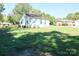 Side view of a light blue house with a grassy yard at 1350 8Th Nw St, Hickory, NC 28601