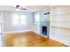 Bright living room featuring hardwood floors and a fireplace at 1350 8Th Nw St, Hickory, NC 28601