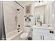 Clean bathroom features a bathtub with a shower, a vanity, and neutral finishes at 2035 Belmont Terraces Ln # 5, Charlotte, NC 28205