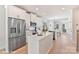 Modern kitchen featuring stainless steel appliances, white cabinets, an island, and plenty of natural light at 2035 Belmont Terraces Ln # 5, Charlotte, NC 28205