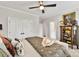 Bright bedroom with king-size bed and built-in shelving at 4813 Cambridge Crescent Dr, Charlotte, NC 28226