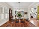 Elegant dining room with hardwood floors and a view of the staircase at 4813 Cambridge Crescent Dr, Charlotte, NC 28226