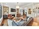 Spacious Gathering room with fireplace and leather armchairs at 4813 Cambridge Crescent Dr, Charlotte, NC 28226