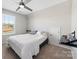 Bedroom with window, closet, and attic access at 50143 Robins Nest Ln, Lancaster, SC 29720