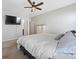 Spacious bedroom with large TV and en-suite bathroom at 50143 Robins Nest Ln, Lancaster, SC 29720