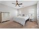 Bright bedroom featuring a ceiling fan and large bed at 50143 Robins Nest Ln, Lancaster, SC 29720