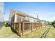 Wooden deck with built in grill and backyard view at 50143 Robins Nest Ln, Lancaster, SC 29720