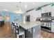 Spacious kitchen with granite countertops, white cabinets, and island at 50143 Robins Nest Ln, Lancaster, SC 29720