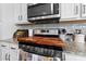 Modern kitchen features stainless steel appliances and granite countertops at 50143 Robins Nest Ln, Lancaster, SC 29720