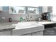 Modern farmhouse kitchen sink with granite countertop at 50143 Robins Nest Ln, Lancaster, SC 29720