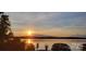 Stunning sunset view over calm lake waters at 50143 Robins Nest Ln, Lancaster, SC 29720