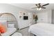 Bright, spacious bedroom features a ceiling fan, a hanging chair, and neutral walls at 7059 Duncan Acres Dr, Belmont, NC 28012