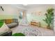 Cozy Bedroom with green accent walls, a patterned rug, and decor at 7059 Duncan Acres Dr, Belmont, NC 28012