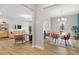 Open dining area leading to the living room, featuring stylish lighting and seating at 7059 Duncan Acres Dr, Belmont, NC 28012