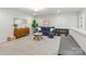 Upstairs living room with comfortable seating, soft carpet, and lots of light at 7059 Duncan Acres Dr, Belmont, NC 28012