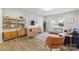 Cozy living room with hardwood floors, modern furniture, and a view of the kitchen at 7059 Duncan Acres Dr, Belmont, NC 28012