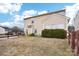 Spacious backyard with a sunroom and wooden fence at 7206 Sandown Ct, Harrisburg, NC 28075