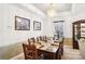 Formal dining room with hardwood floors and a chandelier at 7206 Sandown Ct, Harrisburg, NC 28075