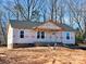 Newly constructed house with brick facade and gray shingle roof at 99 Wilson Ln # 3, Taylorsville, NC 28681